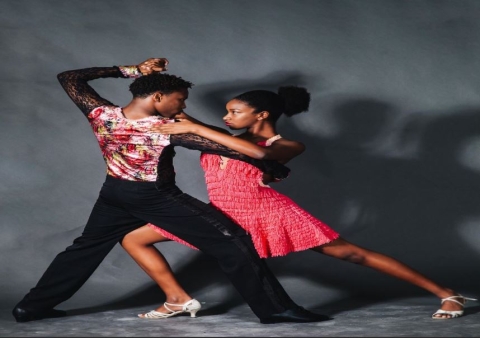 a couple doing a salsa dance