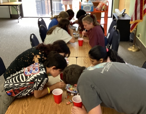 Image of teens playing party game