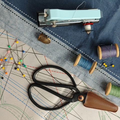 A close-up photo of sewing supplies. 