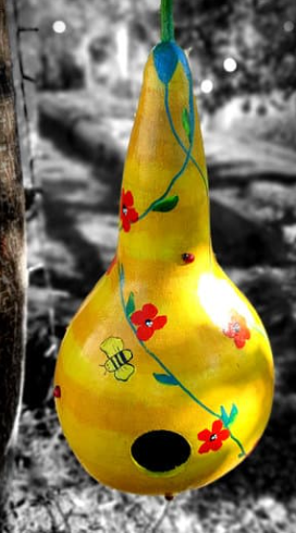 photo of a painted birdhouse gourd